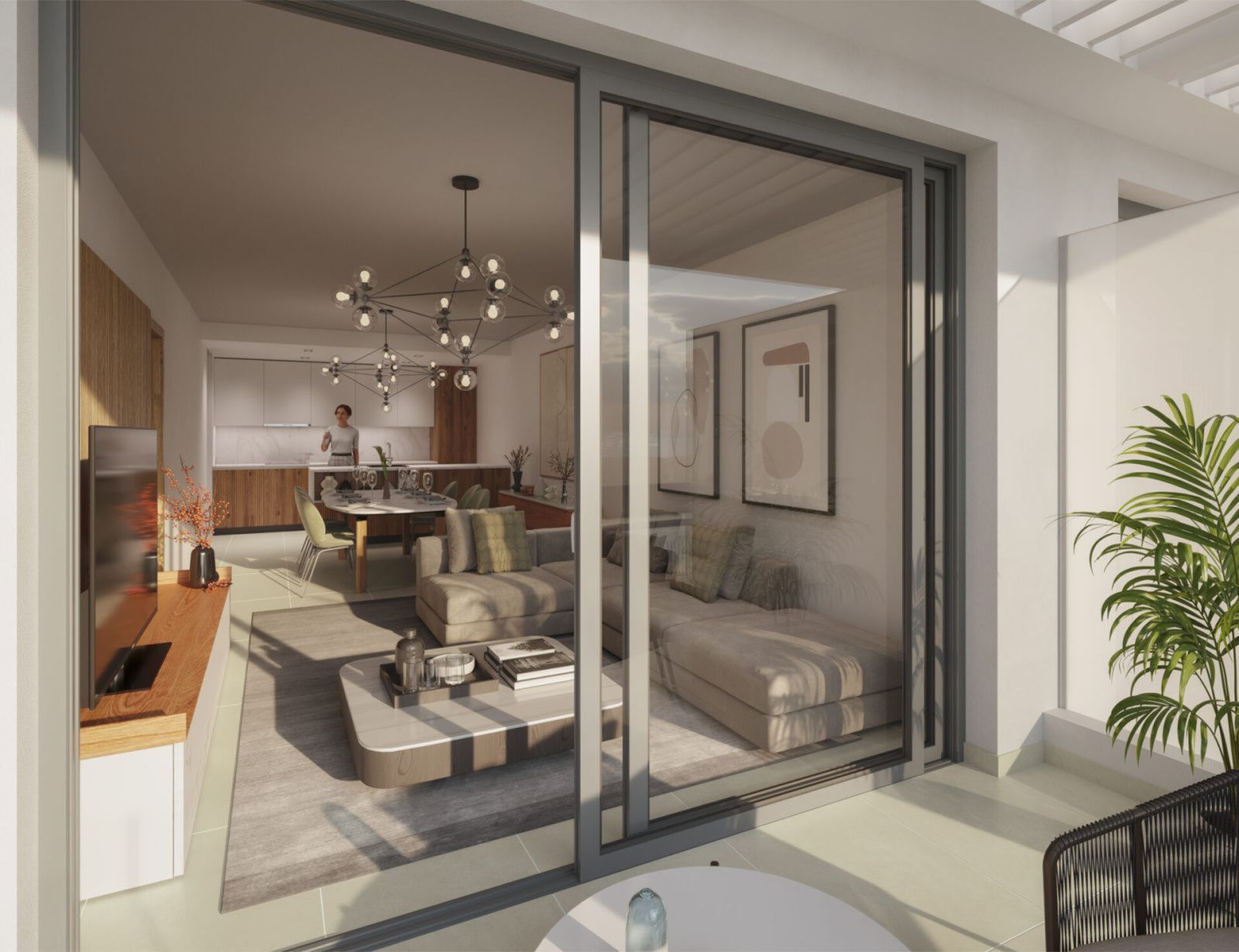 Sala de estar moderna con cocina abierta y balcón.